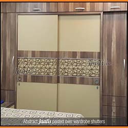 Abstract Jaalis pasted over wardrobe shutters.jpg